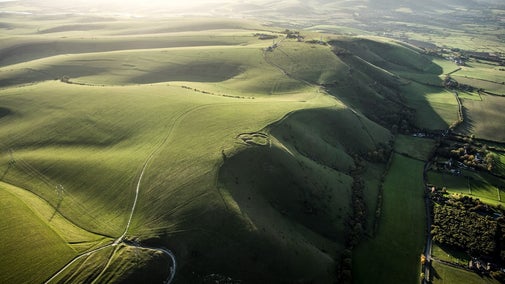 A motte and bailey castle on Edburton Hill looking west to Truleigh Hill.